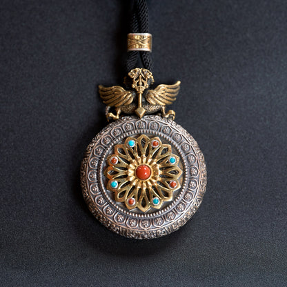 Tibetan silver carved Buddha pendant
