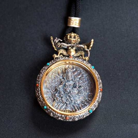 Tibetan silver carved Buddha pendant